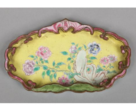 A 19th century Cantonese enamel brush washer. The shaped rim formed from fruit bats, leaves and ruyi branches frames a yellow