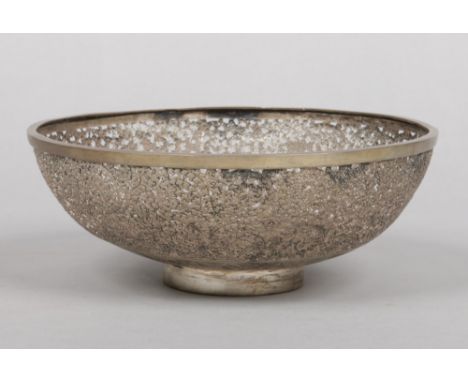 An early 20th century Chinese silver plated bowl. With pierced foliate decoration and with fretwork shou character in the bas