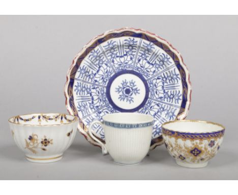 A Worcester small fluted plate decorated in the Royal Lily pattern, a Worcester fluted coffee cup with underglaze blue cell b