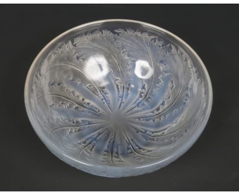 A Rene Lalique glass bowl moulded in the Chicoree pattern with a concentric band of overlapping leaves. Signed R. Lalique, Fr