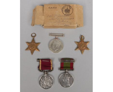 A Victorian Afghanistan medal and Army long service and good conduct medal awarded to 14822 By Sgt Maj E. Harber R. A. along 