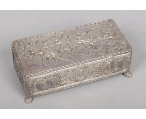 World War I interest. An early 20th century silver plated cigarette box, decorated with a battle scene to the cover by R. Cat