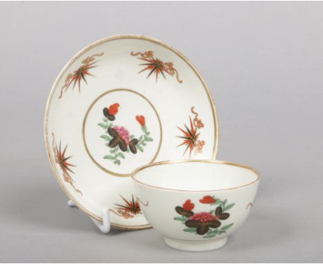 A Worcester teabowl and saucer. Painted in coloured enamels with the Thunder and Lightening pattern c.1770, saucer 12cm diame