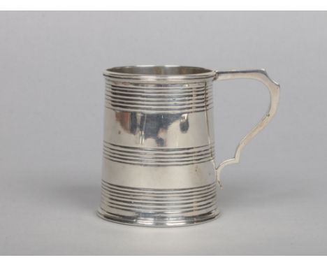 A William IV silver tankard by John Walton. With banded decoration and flat scrolling handle. Assayed Newcastle 1834, 132 gra