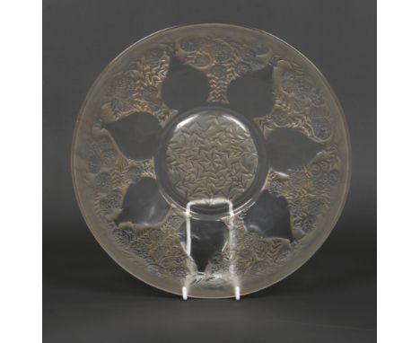 A Rene Lalique Art Deco glass charger. Reverse moulded with the Vases pattern. Moulded R. Lalique and engraved France No. 301
