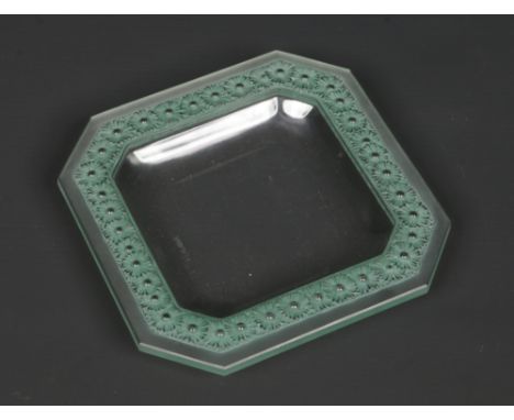 A Rene Lalique square canted dish. Moulded with flowers and with blue enamel in the Paquerettes design. Signed R. Lalique, mo