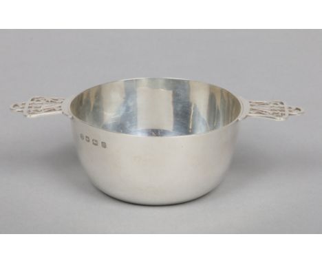 A George V silver quaich by William Hutton &amp; Sons Ltd. With beaded rim and open fret handles. Assayed Sheffield 1930, 127