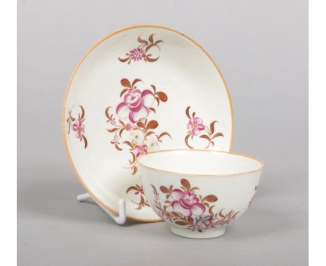 A Worcester teabowl and saucer painted in the Chinese export style with flowers c.1780, saucer 12.25cm diameter.Condition rep