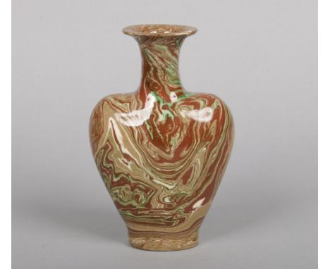 An agate ware flask shaped vase,&nbsp;J. T. Morton of Filey, 22.75cm.