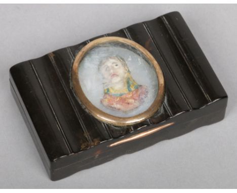 A 19th century tortoiseshell table snuff box with reeded moulding. Set to the top with a coloured wax portrait of Nelson on a