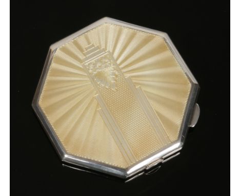 A George V Art Deco silver powder compact by W. I. Broadway &amp; Co. Octagonal in form and with yellow guilloche enamel deco