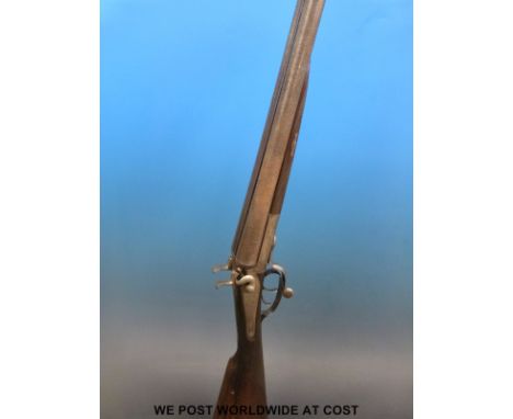 W H Tisdall 12 gauge side by side hammer action shotgun, serial number 4345, by repute used in the filming of Cider With Rosi