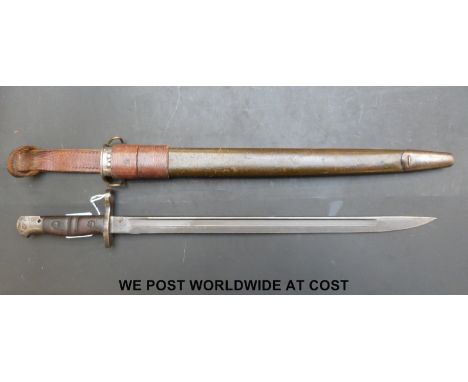 A British P13 bayonet, as taken up by the US, as the MI917 with added clearing hole to pommel, the scabbard with modified top