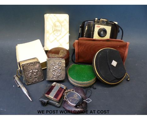 A collection of objets de vertu to include silver cornered miniature prayer book, Yard o' Led silver pencil, compacts, metal 