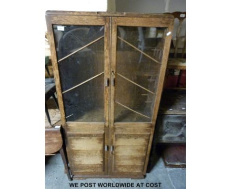 An Art Deco oak display cabinet, tile back washstand and a pine table (cabinet H153 x W77 x D32cm; washstand H123 x W106 x D4