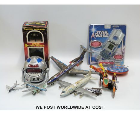 A German tin plate Capital N7402 aeroplane together with various tin plated toys battery operated robot, etc 