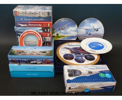 A quantity of Concorde collectables to include Royal Worcester limited edition plate, Concorde simulator game, DVDs, collecto