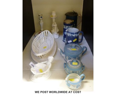 A collection of 19th/20thC Wedgwood Jasperware including a tea set, silver mounted cylindrical vase, creamware basket and und