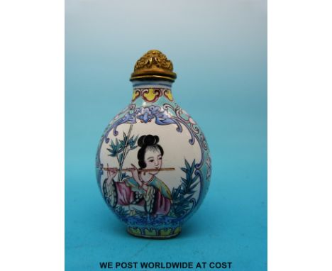 A Chinese enamel snuff bottle decorated with a geisha