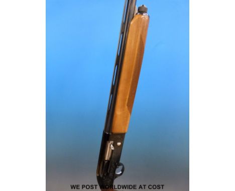 Beretta A301 12 bore semi-automatic shotgun with ornate engraving, semi-pistol grip, vented top rib, multiple chokes and 27.5