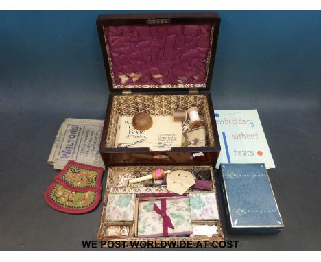 A 19thC rosewood and mother of pearl inlaid work or needlework box with fitted interior and lift out tray. Contents include a