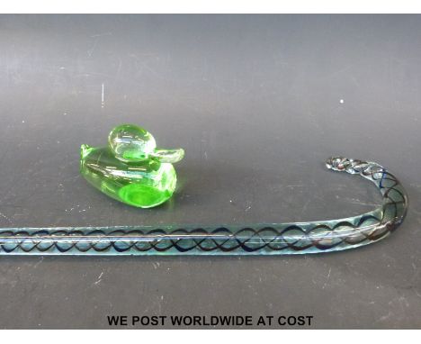A glass walking stick and glass duck