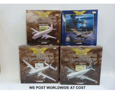 Four Corgi The Aviation Archive diecast model aircraft, three from the Classic Proplines range 48105, AA 30401 and 47601 and 
