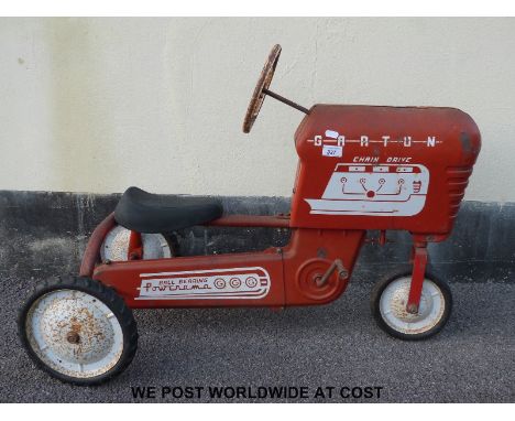 GGG Powerama Garton tin-plate chain drive pedal tractor in red with white logos, 90cm long. 