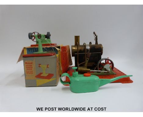 Mamod SE2A stationary live steam engine together with a polishing machine in original box, hammer and a Sutcliffe oil can.  