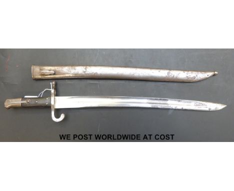 An Austrian yataghan 1867 or 1870 pattern bayonet and scabbard, GF to blade, 16, 106, LR to quillon, 47cm curved blade 