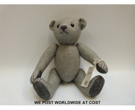 Steiff Original Teddy Bear No. 437 in grey felt, with certificate, 32cm tall. 