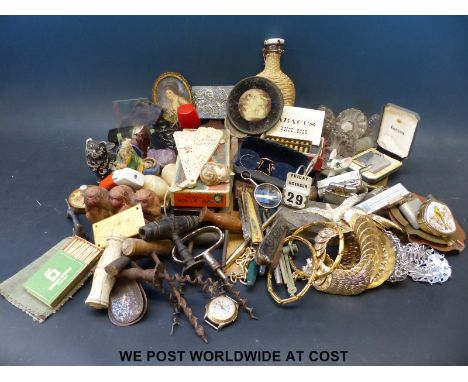 A quantity of collectables to include Ronson and other lighters, portrait miniatures, propelling pencils, corkscrews etc