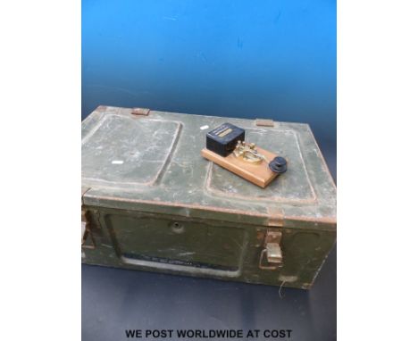A metal ammunition box and Morse key