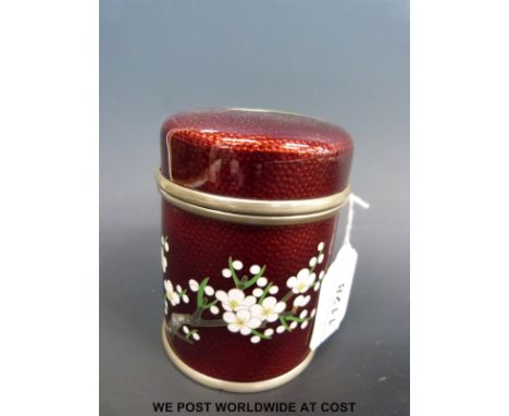A Japanese ginbari white metal tea caddy with bird and prunus decoration on a red ground (10.5cm tall) 
