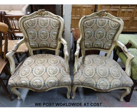 A pair of 19thC French style chairs with gilt detail and tapestry seats