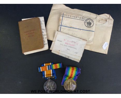 A WWI medal pair awarded to 122402 Gnr W.M Wilkinson R.A together with an 'Active Service' testament 1914-15 bible, medal box