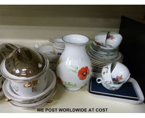 Over 50 pieces of Royal Worcester dinnerware in Evesham & Strawberry Fayre patterns, including tureens, dinner plates, gradua