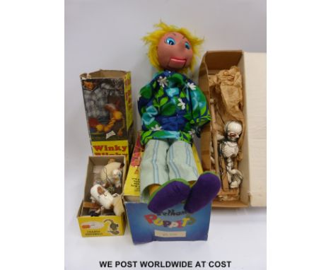 Three Pelham Puppets, Ventriloquial Puppet, Foal and Skeleton together with a Winky Blinky Goony Bird, all in original boxes 