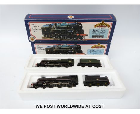 Two Bachmann 00 gauge BR 4-6-0 Standard Class 4 locomotives 75069 in green livery 31-104 and 75006 in black livery 31-103, bo