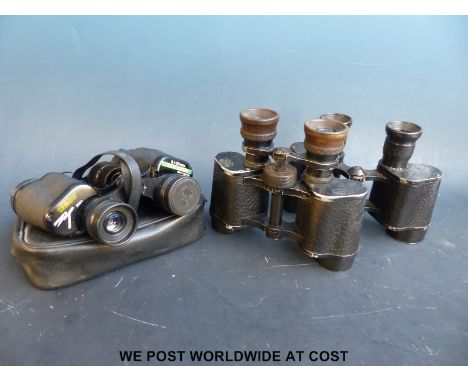 Three pairs of prismatic binoculars comprising Carl Zeiss 12 x 40 No. 887522, Britex 8 x 30 with military arrow mark and case
