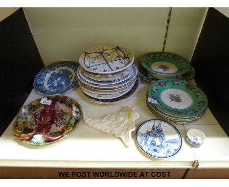 A collection of platters and plates to include blue and white, Susie Cooper, Wedgwood Williamsburg, Cornucopia wall pocket,  