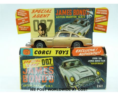 Corgi Toys diecast model Special Agent 007 James Bond's Aston Martin DB5 in original box with picture display stand, secret i