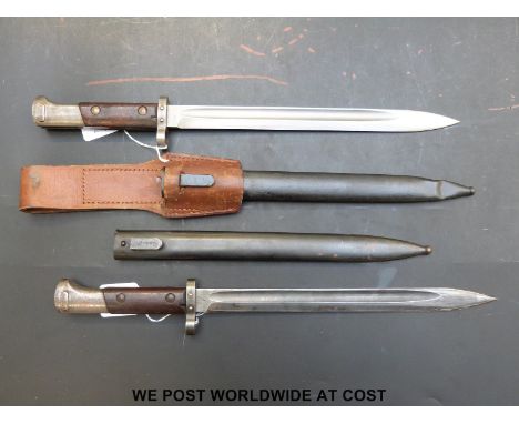 A Czechoslovakian made 1895 pattern bayonet and scabbard, a direct copy of the Austrian 1895, together with a similar example