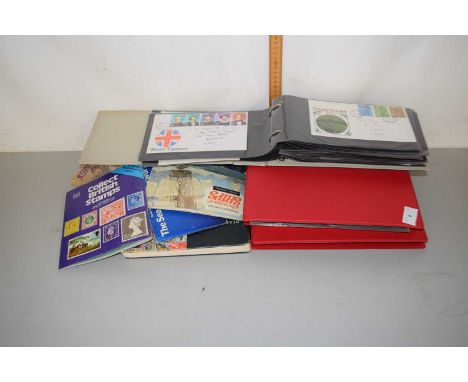 A junior stamp collection featuring a range of British first day covers and other world stamps together with a quantity of Br