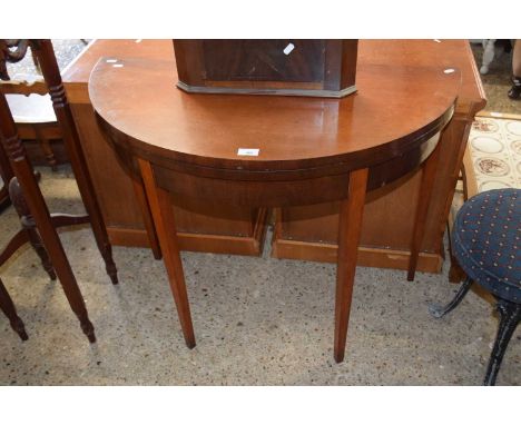 A 19th Century mahogany D shaped card table on tapering legs