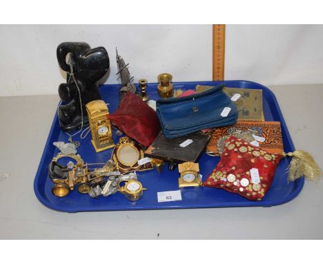 Tray of various miniature clocks, polished stone elephant, vintage photographs etc