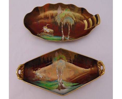 Two Carltonware Rouge Royal hand-painted dishes with herons within a landscape with gilded borders and side handle, 30cm and 