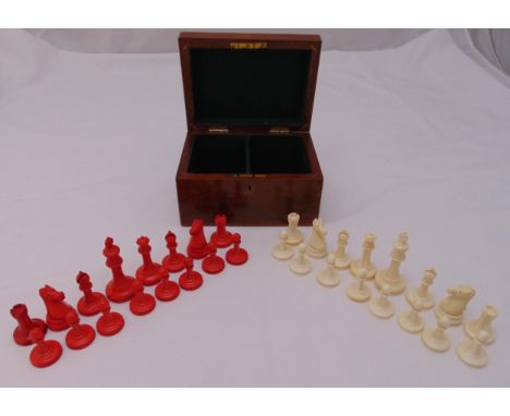 A cased set of composition chess pieces in original wooden lined case, the King 9cm (h)