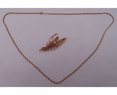 9ct yellow gold and seed pearl brooch and a 9ct gold chain, approx total weight 11.6g