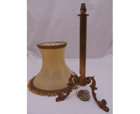 A gilt metal table lamp on triform base to include silk shade, 55.5cm (h)